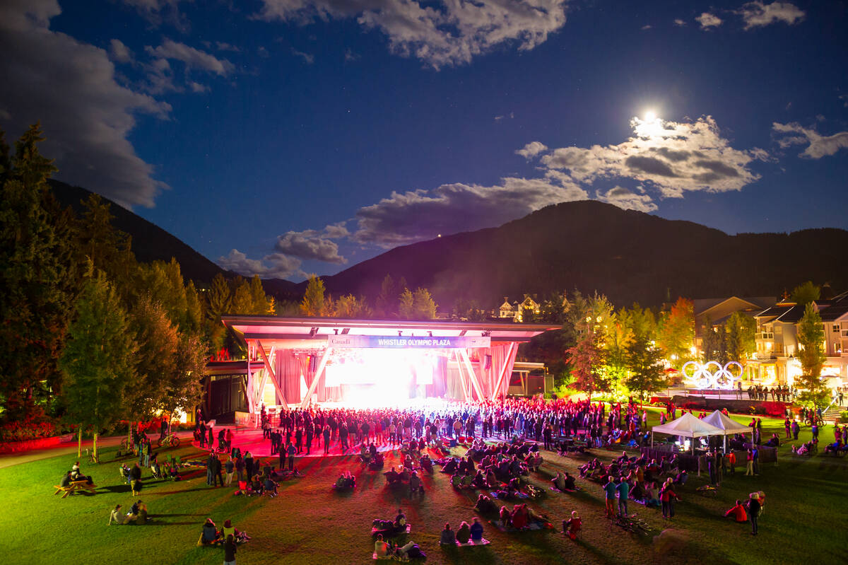 concert series at Olympic plaza at night with moon